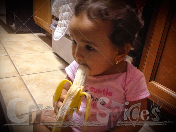 Kaylee eating banana