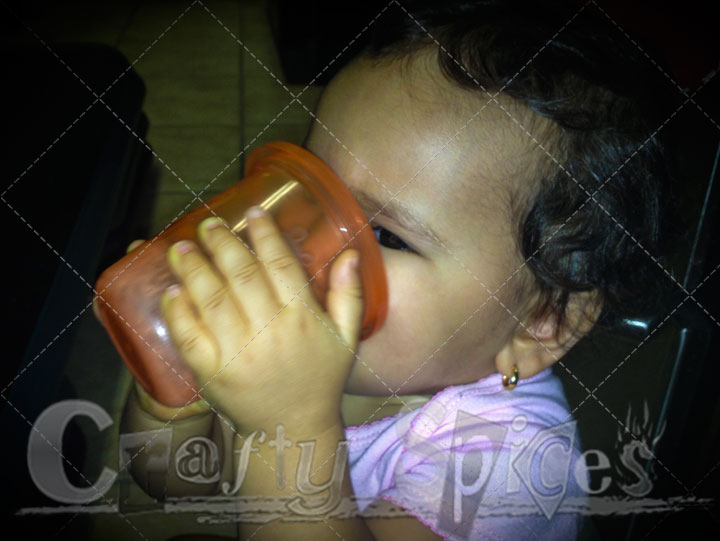 Kaylee drinking Milk out of a cup