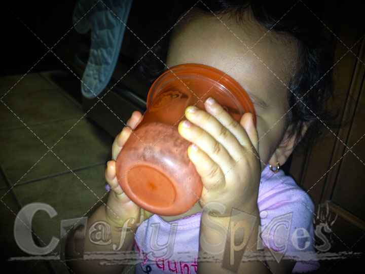 Kaylee drinking Milk out of a cup