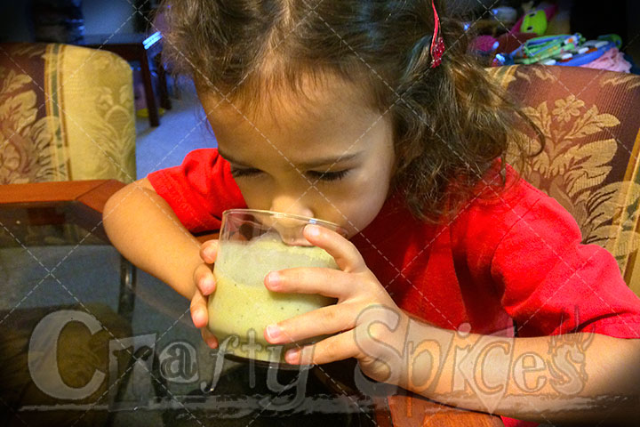 Kira drinking Avocado, Bananaa & Kiwi Shake