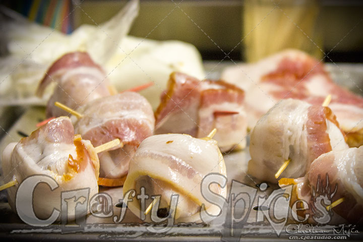 Cream Cheese Stuffed Prunes Wrapped in Bacon before putting into the oven