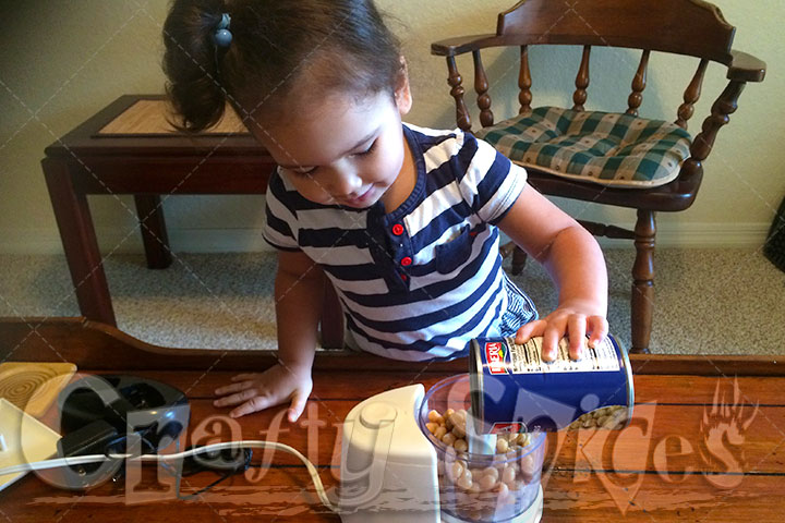 Kaylee helping us make Peanut Butter Hummus