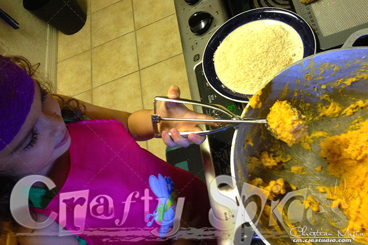 Kira helping us make Sweet Potatoes Rice Krispies bites