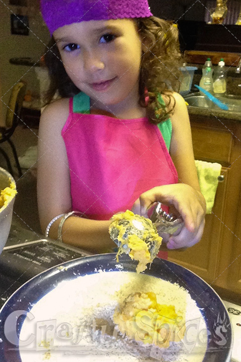 Kira helping us make Sweet Potatoes Rice Krispies bites