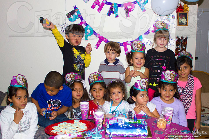 Boy and Girls gathered together around the #DisneySide Cake Table