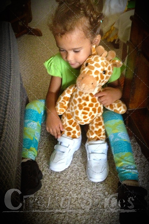 Kira putting Sneakers to Little G