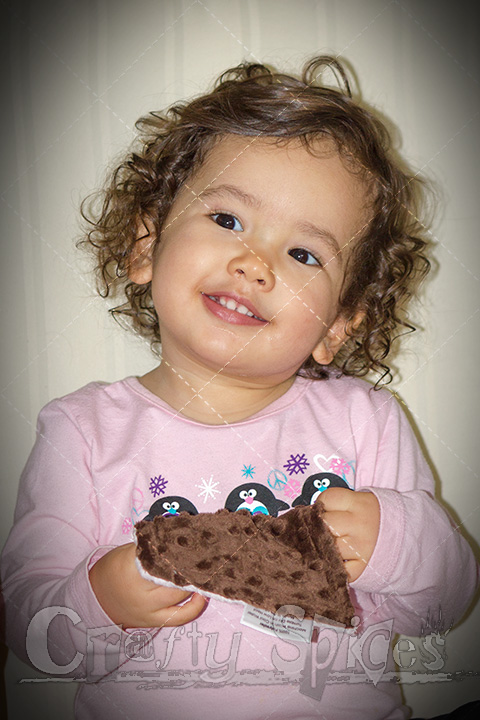 Kaylee Playing with her Bebe Bella Designs Crinkle Toy