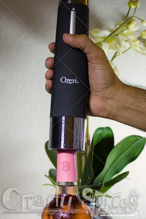 Ozeri OW05A Prestige Electric Wine Bottle Opener opening a bottle