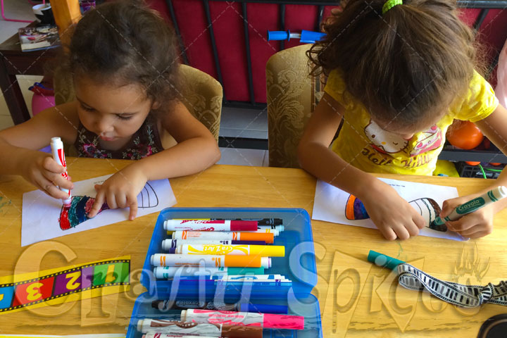 The Girls coloring with Markers 