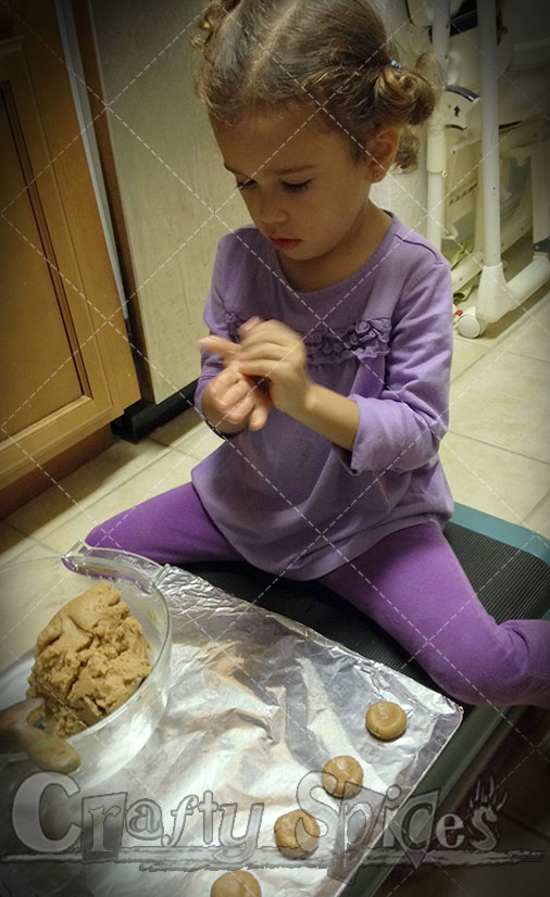 Kira still helping in the kitchen, baking Cookies