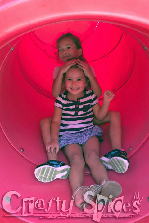 Our two little girls having fun at the Playground